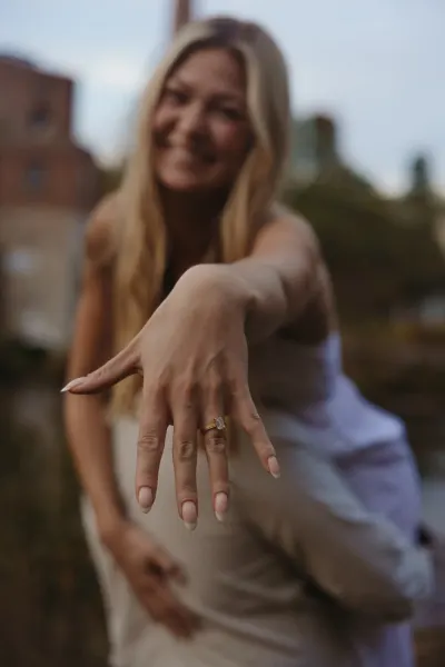 Woman showing off engagement ring with blurred background — Prior Lake, Minnesota wedding photography by Emma Ziegler, Honey Deww Photography