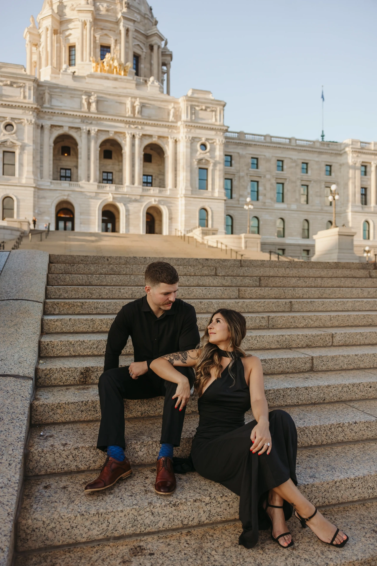 Couple sitting on state capitol steps at golden hour — Twin Cities couples & engagement photographer Emma Ziegler, Honeydew Photography (Minneapolis, Minnesota)