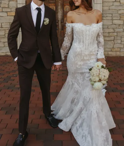 Bride in lace gown and groom in brown suit holding hands on brick — Edina, Minnesota wedding photography by Emma Ziegler, Honey Deww Photography