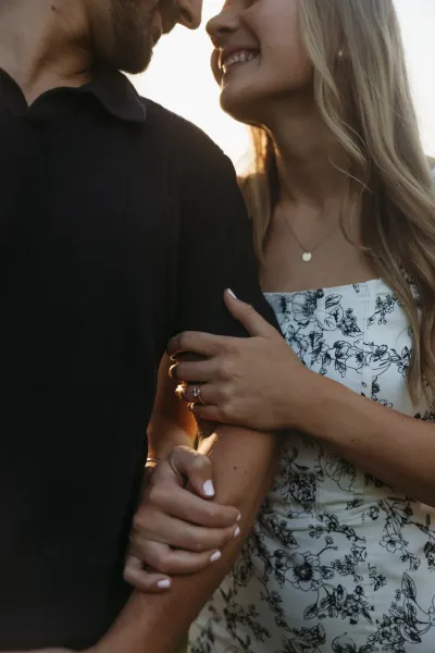 Close-up of couple's hands with engagement ring in golden light — Maple Plain, Minnesota wedding photography by Emma Ziegler, Honey Deww Photography